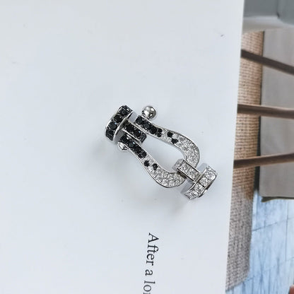 ```json
[
  {
    "Azure Tears": "[Azure Tears]FORCE LARGE HORSESHOE BLACK & WHITE DIAMOND BRACELET - ROSE GOLD"
  }
]
```