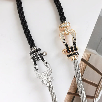 ```json
[
  {
    "Azure Tears": "[Azure Tears]FORCE LARGE HORSESHOE BLACK & WHITE DIAMOND BRACELET - ROSE GOLD"
  }
]
```